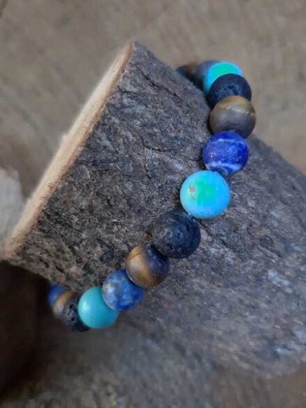 Armband die je zal laten stralen met turkoois, tijgeroog, sodaliet en lavasteen, fijn om etherische olie op te druppelen + flesje olie